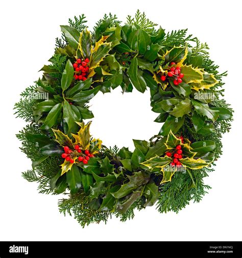 Christmas holly wreath isolated on a white background Stock Photo - Alamy