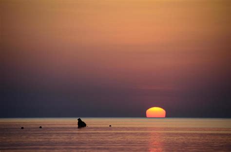 sunrise on the horizon and the sea 6182929 Stock Photo at Vecteezy