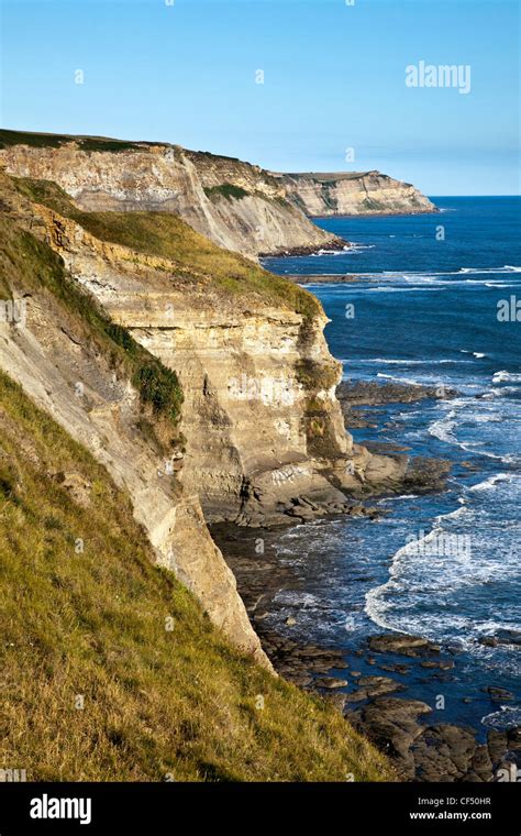 Steep cliffs on the North Yorkshire Coast, by the North Sea Stock Photo ...