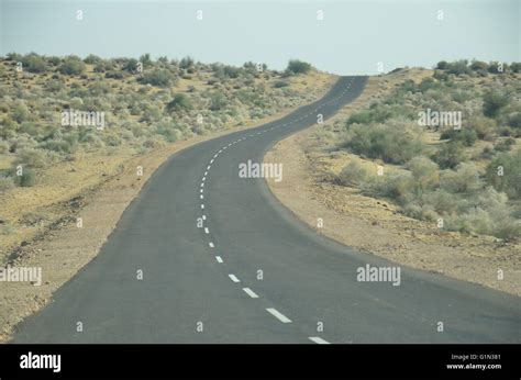 Highway towards Indo-Pak border, Thar desert, Rajasthan, India Stock Photo - Alamy