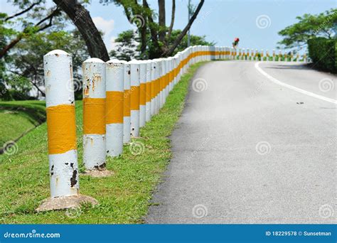 A Row of Road Bollards stock photo. Image of rail, highway - 18229578