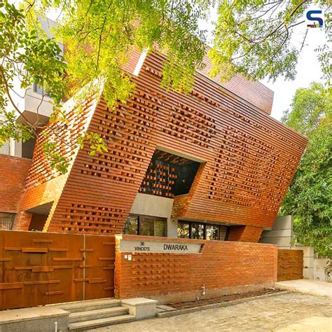 A Rustic Yet Futuristic Parametric Brick Facade Wraps This Residential ...