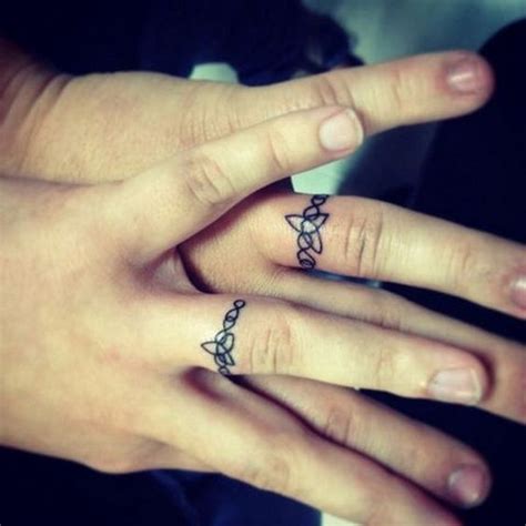 40+ Sweet & Meaningful Wedding Ring Tattoos | Styletic