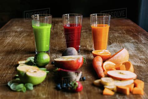 Close-up view of various organic fruit and vegetable smoothies with ...