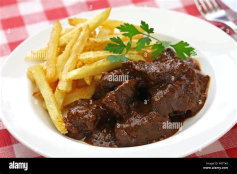 carbonade flamande with frites , flemish beef stew, belgian cuisine Stock Photo - Alamy