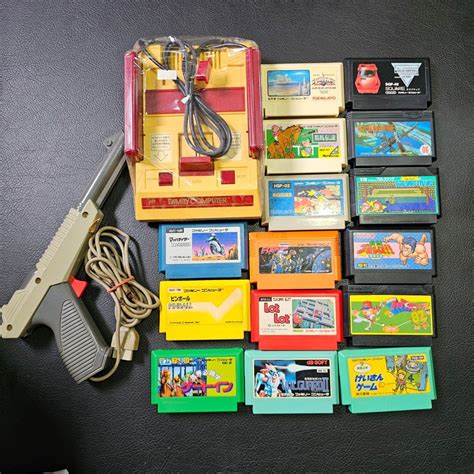 Nintendo Famicom 2 consoles 25 games and light gun, Video Gaming, Video ...