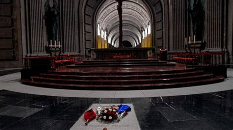 Flowers and anger in the shadow of Franco’s tomb