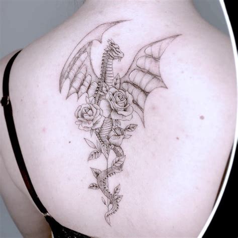 Aggregate 73+ dragon tattoo with roses - in.cdgdbentre