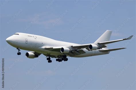 Cargo plane landing at JFK Stock Photo | Adobe Stock