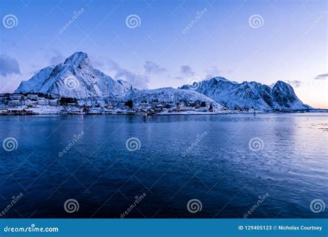 The Epic Snow Covered Mountains of the Lofoten Islands. Reine, Norway Stock Image - Image of ...