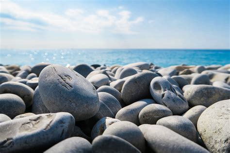 Free Images : beach, sea, coast, sand, rock, ocean, shore, stone, pebble, blue, material ...