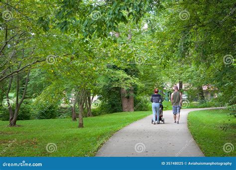 Family Walking in the Park stock image. Image of country - 35748025