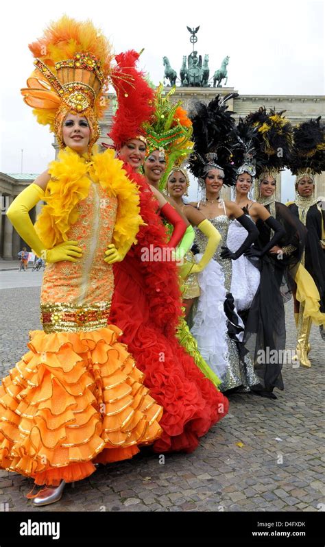 Dancers of Cuban dancing group 'Tropicana' pose in colourful costumes ...