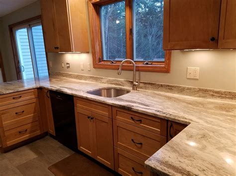 Brown Fantasy Granite Counter tops. Waypoint cabinets in Maple color ...