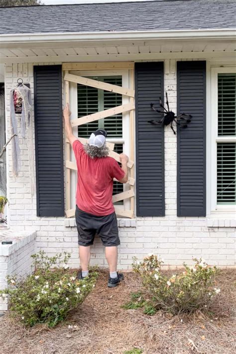 DIY Halloween Decorations: Spooky Boarded Up Windows - Your Home Renewed