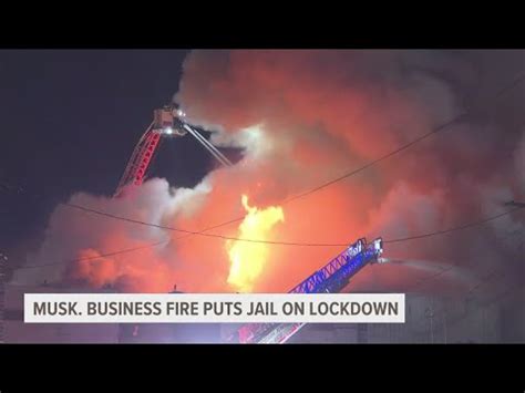 Muskegon business on fire, Muskegon County Jail goes on lockdown - YouTube