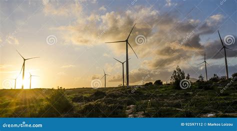 Wind Turbines during a Dramatic Sunset Stock Photo - Image of mast, farm: 92597112