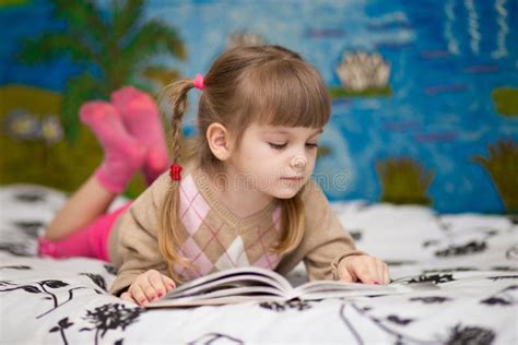 Little Cheerful Girl Read Book in Bed Stock Image - Image of morning ...