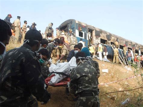 Fire aboard sleeper train in southern India kills 26 | The Independent | The Independent