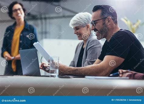 Happy Business People in a Meeting Stock Photo - Image of brainstorming, entrepreneur: 170528256