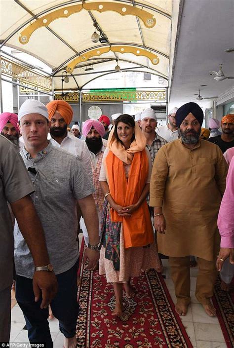 UN Ambassador Nikki Haley prays at a Sikh temple as she continues her ...