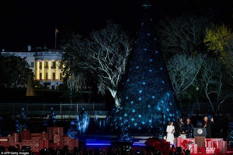 Obama and the First Family light the National Christmas Tree at the ...