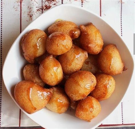 Egyptian Zalabia balls Heavenly dessert , eating freshly fried and ...