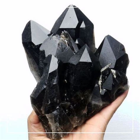 Black crystal in it's natural form, all the beauty is in the natural formation | Minerals and ...