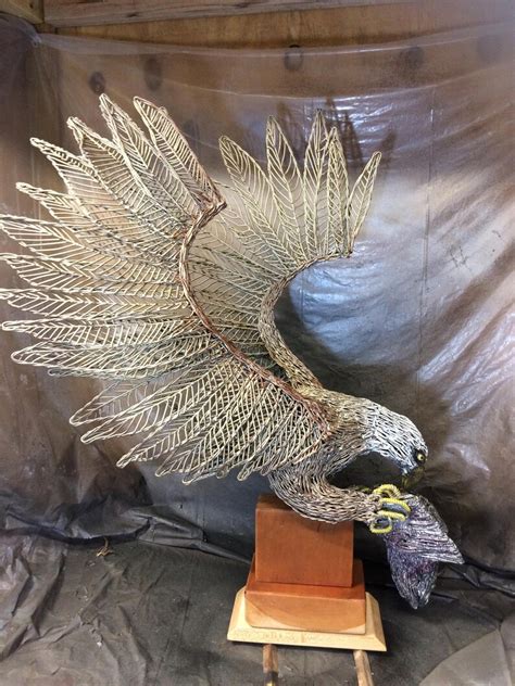 Metal wire Sculpture of Bald Eagle catching fish | Etsy