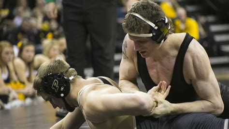 HAWKEYE WRESTLING DEMOLISHES IOWA STATE, 26-9 - Black Heart Gold Pants