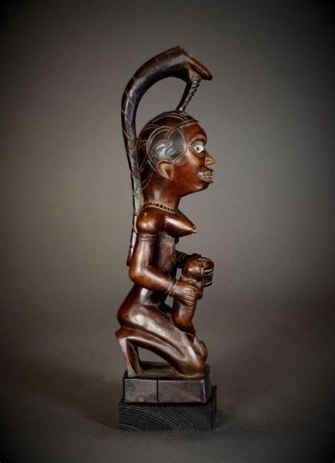 Impressive African Tribal PHEMBA / YOMBE Maternity figure. Democratic Republic of the Congo.