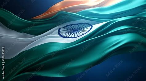 The Indian tricolor flag waves majestically with a dark, moody background, highlighting the ...