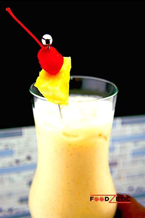 Pina Colada Cocktail With Dark Rum And Cinnamon | Foodzetic