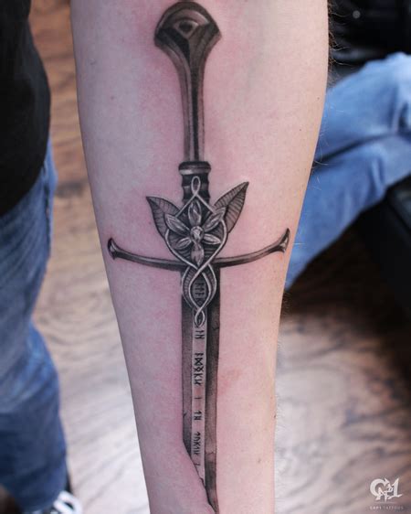 Cap1 Tattoos : Tattoos : Capone : Lord of the Rings Anduril Sword Tattoo