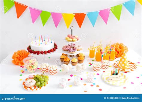 Food and Drinks on Table at Birthday Party Stock Photo - Image of dessert, indoors: 143805030