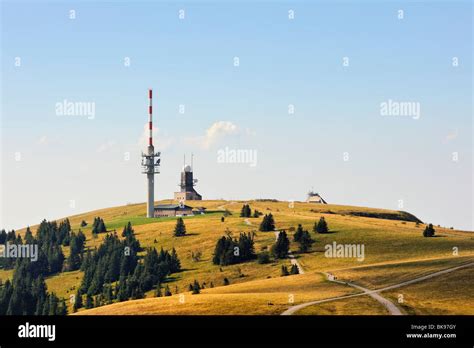 View towards the summit of Feldberg Mountain with weather station and Feldberg Tower ...