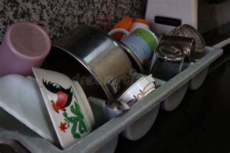 Photo of a Pile of Dishes in the Kitchen in an Apartment Stock Photo ...