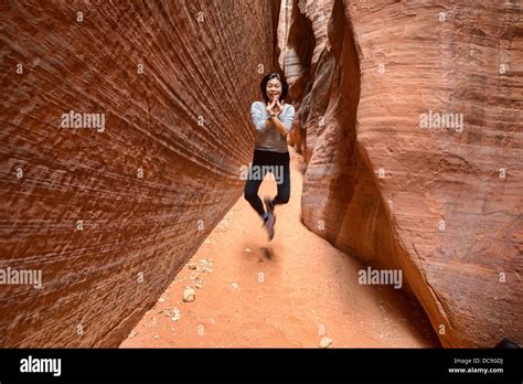 Hiker having fun in the Buckskin Gulch slot canyon, Kanab, Utah Stock ...