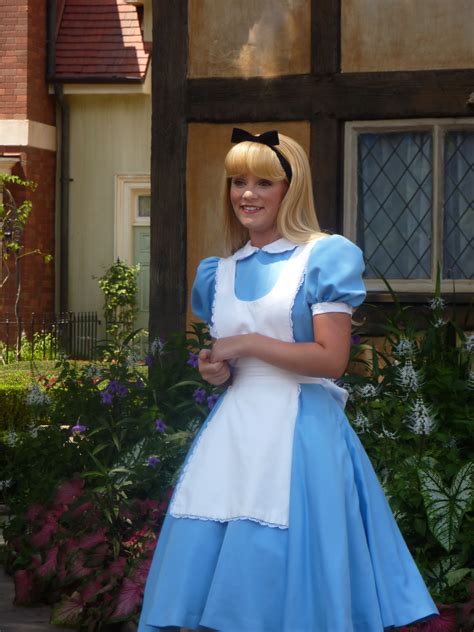 Alice in Wonderland at Epcot | Alice in wonderland pictures, Disney alice, Alice in wonderland dress