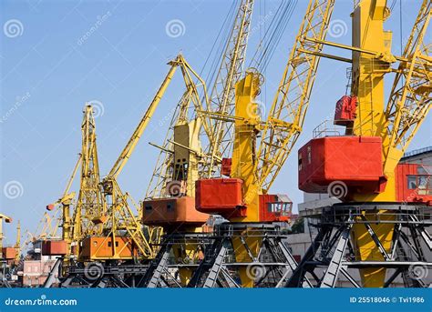 Industrial cranes on dock stock photo. Image of background - 25518046