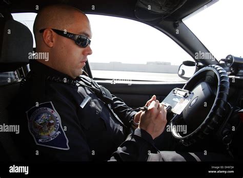 Nevada State Police, State Trooper Highway Patrol officer checks a ...