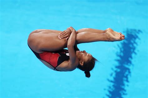 Olympic Diving Into A Pool