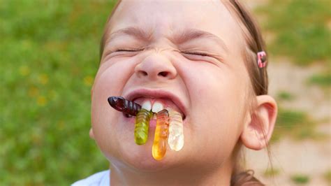 The Science Behind The Funny Faces We Make When Eating Sour Candy