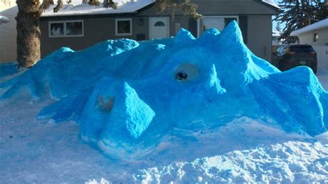 Giant snow dragon returns to Saskatoon, ‘Snomacron’ breathes smoke ...