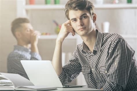 Premium Photo | Man in office using laptop