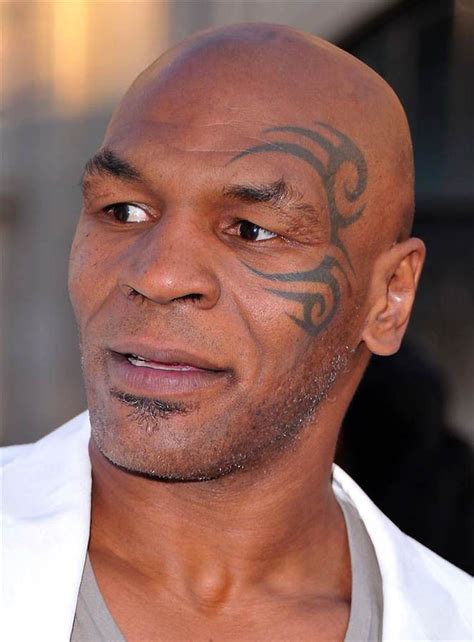 Hollywood Stars With Tattoos: Mike Tyson Tattoo With Maori Symbol ...