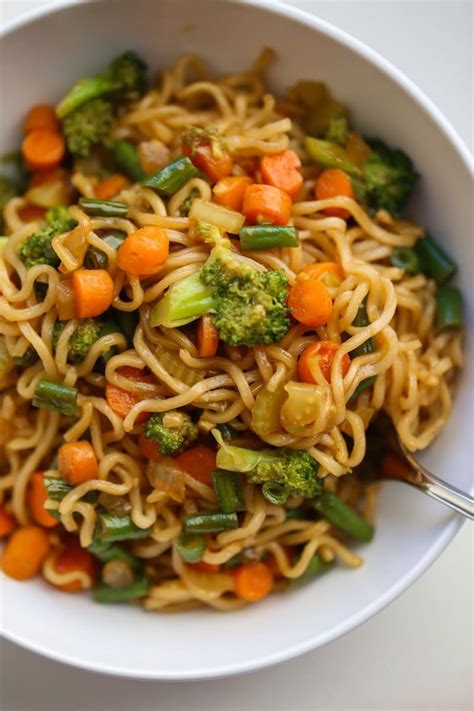 Prepackaged ramen noodles cooked and stir fried with tons of veggies in a homemade sweet asian ...