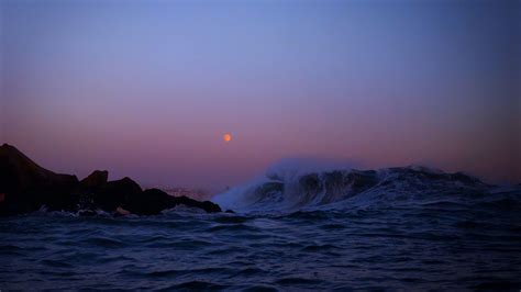 Download wallpaper 3840x2160 moon, rocks, sea, waves 4k uhd 16:9 hd background