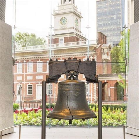 Color photo showing the Liberty Bell in the foreground with ...