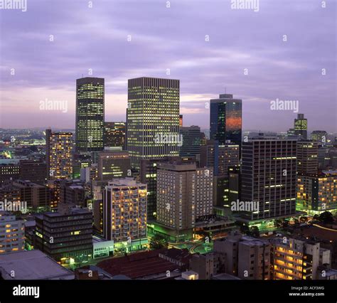 Johannesburg city centre at Dusk showing the Carlton center on the left ...